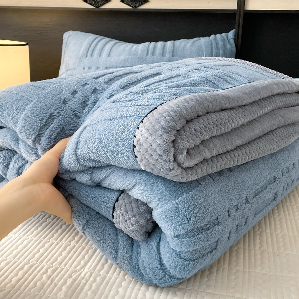 Couverture en polaire bleu clair texturée à motif jacquard plaid carré
